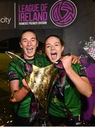 11 November 2023; Ellen Dolan and Rebecca Watkins of Peamount United celebrate with the SSE Airtricity Women's Premier Division trophy after the SSE Airtricity Women's Premier Division match between Peamount United and Sligo Rovers at PRL Park in Greenogue, Dublin. Photo by Stephen McCarthy/Sportsfile