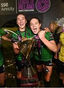 11 November 2023; Ellen Dolan, left, and Rebecca Watkins of Peamount United celebrate with the SSE Airtricity Women's Premier Division trophy after the SSE Airtricity Women's Premier Division match between Peamount United and Sligo Rovers at PRL Park in Greenogue, Dublin. Photo by Stephen McCarthy/Sportsfile