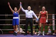 11 November 2023; Michaela Walsh of Holy Family Golden Gloves Boxing Club, Belfast, left, is declared victorious over Kellie McLoughlin of St Catherine's Boxing Club, Dublin, right, after their featherweight 57kg final bout at the IABA National Elite Boxing Championships 2024 Finals at the National Boxing Stadium in Dublin. Photo by Seb Daly/Sportsfile
