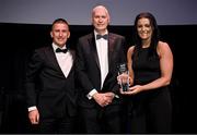 11 November 2023; Olympians Rob Heffernan, left, and Marian Heffernan are presented with the Flogas Community Ambassador of the Year award by Flogas Ireland managing director John Rooney at the Team Ireland Olympic Ball at the Mansion House in Dublin. The event was a joint celebration of the brilliant performances of Team Ireland athletes at the European Games this summer, as well as the announcement of the winners of the Olympic Federation of Ireland Annual Awards. The event was attended by the Minister for Tourism, Culture, Arts, Gaeltacht, Sport and Media, Catherine Martin TD, Minister of State for Sport and Physical Education, Thomas Byrne TD, Olympic medallists, European Games athletes, Team Ireland Sponsors and Partners, Sport Ireland and the wider Olympic family. Photo by David Fitzgerald/Sportsfile