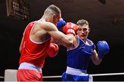 11 November 2023; Vitali Ustimov of Celtic Eagles Boxing Club, Galway, left, and James Redmond of Ballybrack Boxing Club, Dublin, during their cruiserweight 86kg final bout at the IABA National Elite Boxing Championships 2024 Finals at the National Boxing Stadium in Dublin. Photo by Seb Daly/Sportsfile