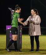11 November 2023; Karen Duggan of Peamount United is presented with her winners medal by SSE Airtricity marketing specialist Ruth Rapple after the SSE Airtricity Women's Premier Division match between Peamount United and Sligo Rovers at PRL Park in Greenogue, Dublin. Photo by Stephen McCarthy/Sportsfile