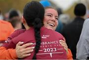 12 November 2023; Aoibhín O'Hara, right, embraces her sister Rebecca O'Hara after they completed the Remembrance Run 5K, supported by Silver Stream Healthcare, at the Phoenix Park in Dublin. Photo by Brendan Moran/Sportsfile