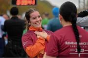 12 November 2023; Aoibhín O'Hara, right, reacts with her sister Rebecca O'Hara after they completed the Remembrance Run 5K, supported by Silver Stream Healthcare, at the Phoenix Park in Dublin. Photo by Brendan Moran/Sportsfile