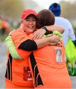 12 November 2023; Ger, left, and Imelda Doyle embrace after fnishing the Remembrance Run 5K, supported by Silver Stream Healthcare, at the Phoenix Park in Dublin. Photo by Brendan Moran/Sportsfile