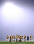 11 November 2023; The Crossmaglen Rangers team during the playing of the National Anthem before the AIB Ulster GAA Football Senior Club Championship quarter-final match between Trillick of Tyrone and Crossmaglen Rangers of Armagh at O'Neills Healy Park in Omagh, Tyrone. Photo by Ramsey Cardy/Sportsfile