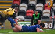 12 November 2023; Thomas Clarkson of Leinster dives over to score his side's second try despite the tackle of Matthew Screech of Dragons during the United Rugby Championship match between Dragons and Leinster at Rodney Parade in Newport, Wales. Photo by Harry Murphy/Sportsfile