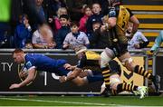 12 November 2023; Ciarán Frawley of Leinster dives over to score his side's third try despite the tackle of Aaron Wainwright of Dragons during the United Rugby Championship match between Dragons and Leinster at Rodney Parade in Newport, Wales. Photo by Harry Murphy/Sportsfile