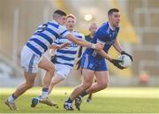 12 November 2023; Sean Collins of Cratloe is tackled by Rory Maguire of Castlehaven during the AIB Munster GAA Football Senior Club Championship quarter-final match between Castlehaven, Cork, and Cratloe, Clare, at Páirc Uí Chaoimh in Cork. Photo by Tom Beary/Sportsfile