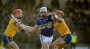 12 November 2023; Jamie Mulkearns of Raharney in action against Colin Currie, left, and AJ Murphy of Na Fianna during the AIB Leinster GAA Hurling Senior Club Championship quarter-final match between Raharney, Westmeath, and Na Fianna, Dublin, at TEG Cusack Park in Mullingar, Westmeath. Photo by Daire Brennan/Sportsfile