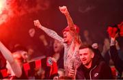 12 November 2023; Bohemians supporters celebrate their side's first goal, a penalty scored by Jonathan Afolabi, during the Sports Direct FAI Cup Final between Bohemians and St Patrick's Athletic at the Aviva Stadium in Dublin. Photo by Seb Daly/Sportsfile