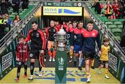 12 November 2023; Team captains Jordan Flores of Bohemians, left, and Joe Redmond of St Patrick's Athletic leads their side's out before the Sports Direct FAI Cup Final between Bohemians and St Patrick's Athletic at the Aviva Stadium in Dublin. Photo by Stephen McCarthy/Sportsfile
