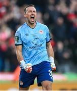 12 November 2023; St Patrick's Athletic goalkeeper Dean Lyness celebrates his side's first goal, scored by Mark Doyle, during the Sports Direct FAI Cup Final between Bohemians and St Patrick's Athletic at the Aviva Stadium in Dublin. Photo by Stephen McCarthy/Sportsfile