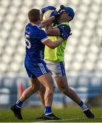 12 November 2023; Darragh Cahalane of Castlehaven is tackled by Padraic Collins of Cratloe during the AIB Munster GAA Football Senior Club Championship quarter-final match between Castlehaven, Cork, and Cratloe, Clare, at Páirc Uí Chaoimh in Cork. Photo by Tom Beary/Sportsfile