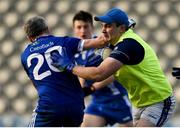 12 November 2023; Darragh Cahalane of Castlehaven is tackled by Ogie Murphy of Cratloe during the AIB Munster GAA Football Senior Club Championship quarter-final match between Castlehaven, Cork, and Cratloe, Clare, at Páirc Uí Chaoimh in Cork. Photo by Tom Beary/Sportsfile