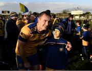 12 November 2023; Colin Currie of Na Fianna celebrates with Na Fianna player Harry Cunningham, aged 9, after the AIB Leinster GAA Hurling Senior Club Championship quarter-final match between Raharney, Westmeath, and Na Fianna, Dublin, at TEG Cusack Park in Mullingar, Westmeath. Photo by Daire Brennan/Sportsfile