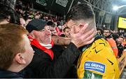 12 November 2023; Joe Redmond of St Patrick's Athletic celebrates with his father Tom after the Sports Direct FAI Cup Final between Bohemians and St Patrick's Athletic at the Aviva Stadium in Dublin. Photo by Seb Daly/Sportsfile