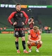 12 November 2023; Adam McDonnell, left, and Bohemians goalkeeper James Talbot react after the Sports Direct FAI Cup Final between Bohemians and St Patrick's Athletic at the Aviva Stadium in Dublin. Photo by Seb Daly/Sportsfile