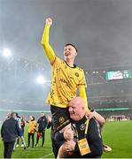 12 November 2023; St Patrick's Athletic's Chris Forrester, top, and masseuse Christy O'Neill celebrate after the Sports Direct FAI Cup Final between Bohemians and St Patrick's Athletic at the Aviva Stadium in Dublin. Photo by Seb Daly/Sportsfile