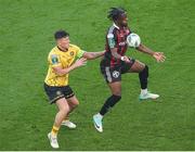 12 November 2023; Jonathan Afolabi of Bohemians in action against Joe Redmond of St Patrick's Athletic during the Sports Direct FAI Cup Final between Bohemians and St Patrick's Athletic at the Aviva Stadium in Dublin. Photo by Michael P Ryan/Sportsfile