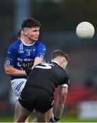 12 November 2023; Mattie Maguire of Scotstown is blocked by Ryan McEvoy of Kilcoo during the AIB Ulster GAA Football Senior Club Championship quarter-final match between Kilcoo, Down, and Scotstown, Monaghan, at Pairc Esler in Newry, Down. Photo by Stephen Marken/Sportsfile