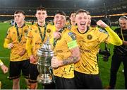 12 November 2023; St Patrick's Athletic players, from left, Conor Carty, Mason Melia, Joe Redmond and Chris Forrester of St Patrick's Athletic celebrate with the FAI Cup after the Sports Direct FAI Cup Final between Bohemians and St Patrick's Athletic at the Aviva Stadium in Dublin. Photo by Stephen McCarthy/Sportsfile
