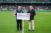 12 November 2023; Mick Murphy of Treaty United is presented with the Bank of Ireland Healty Football League award by Morgan Whelan, Bank of Ireland, branch manager at O'Connell Street, Limerick, at half-time of the Sports Direct FAI Cup Final between Bohemians and St Patrick's Athletic at the Aviva Stadium in Dublin. Photo by Stephen McCarthy/Sportsfile