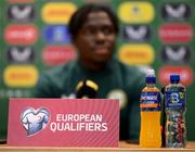 14 November 2023; A general view of Ballygowan and Energise Sport bottles in front of Festy Ebosele during a Republic of Ireland press conference at the FAI Headquarters in Abbotstown, Dublin. Photo by Stephen McCarthy/Sportsfile