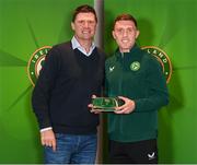 13 November 2023; Dara O'Shea is presented with his 2022-2023 Republic of Ireland international cap by former Republic of Ireland player Niall Quinn at the Castleknock Hotel in Dublin. Photo by Stephen McCarthy/Sportsfile