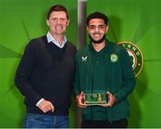 13 November 2023; Andrew Omobamidele is presented with his 2022-2023 Republic of Ireland international cap by former Republic of Ireland player Niall Quinn at the Castleknock Hotel in Dublin. Photo by Stephen McCarthy/Sportsfile