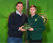 13 November 2023; Evan Ferguson is presented with his 2022-2023 Republic of Ireland international cap by former Republic of Ireland player Niall Quinn at the Castleknock Hotel in Dublin. Photo by Stephen McCarthy/Sportsfile