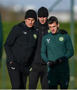 15 November 2023; Jason Knight with coaches Keith Andrews, left, and John O'Shea, centre, during a Republic of Ireland training session at the FAI National Training Centre in Abbotstown, Dublin. Photo by Stephen McCarthy/Sportsfile