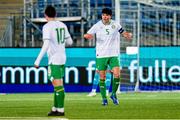 17 November 2023; Anselmo Garcia Macnulty of Republic of Ireland converses with team-mate Kian Leavy after their side conceded a goal during the UEFA European Under-21 Championship Qualifier match between Norway and Republic of Ireland at Marienlyst Stadion in Drammen, Norway. Photo by Marius Simensen/Sportsfile