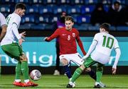 17 November 2023; Kristian Fredrik Malt Arnstad of Norway in action against Sean Roughan, left, and Kian Leavy of Republic of Ireland during the UEFA European Under-21 Championship Qualifier match between Norway and Republic of Ireland at Marienlyst Stadion in Drammen, Norway. Photo by Marius Simensen/Sportsfile