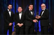 17 November 2023; John Conlan of Clare is presented with his PwC All-Star award by Uachtarán Chumann Lúthchleas Gael Larry McCarthy, in the company of Gaelic Players Association chief executive Tom Parsons, left, and PwC managing partner Enda McDonagh during the 2023 PwC GAA/GPA All-Star Awards at the RDS in Dublin. Photo by Brendan Moran/Sportsfile