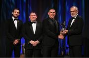 17 November 2023; Darragh O'Donovan of Limerick is presented with his PwC All-Star award by Uachtarán Chumann Lúthchleas Gael Larry McCarthy, in the company of Gaelic Players Association chief executive Tom Parsons, left, and PwC managing partner Enda McDonagh during the 2023 PwC GAA/GPA All-Star Awards at the RDS in Dublin. Photo by Brendan Moran/Sportsfile
