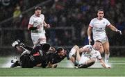 17 November 2023; Nathan Doak of Ulster is tackled by Emmanuel Tshituka, left, and Marius Louw of Emirates Lions during the United Rugby Championship match between Ulster and Emirates Lions at Kingspan Stadium in Belfast. Photo by Ramsey Cardy/Sportsfile