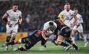 17 November 2023; Rob Herring of Ulster is tackled by Francke Horn, left, and Hanru Sirgel of Emirates Lions during the United Rugby Championship match between Ulster and Emirates Lions at Kingspan Stadium in Belfast. Photo by Ramsey Cardy/Sportsfile