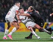 17 November 2023; PJ Botha of Emirates Lions is tackled by Jake Flannery of Ulster during the United Rugby Championship match between Ulster and Emirates Lions at Kingspan Stadium in Belfast. Photo by Ramsey Cardy/Sportsfile