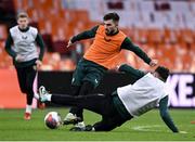 17 November 2023; Ryan Manning is tackled by Troy Parrott during a Republic of Ireland training session at Johan Cruijff ArenA in Amsterdam, Netherlands. Photo by Stephen McCarthy/Sportsfile