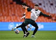 17 November 2023; Mikey Johnston is tackled by Dara O'Shea, right, during a Republic of Ireland training session at Johan Cruijff ArenA in Amsterdam, Netherlands. Photo by Stephen McCarthy/Sportsfile