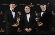 17 November 2023; PwC managing partner Enda McDonagh, centre, alongside David Clifford of Kerry with his PwC GAA/GPA Footballer of the Year award and Aaron Gillane of Limerick with his PwC GAA/GPA Hurler of the Year award during the 2023 PwC GAA/GPA All-Star Awards at the RDS in Dublin. Photo by David Fitzgerald/Sportsfile