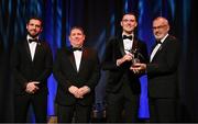 17 November 2023; Brian Fenton of Dublin is presented with his PwC All-Star award by Uachtarán Chumann Lúthchleas Gael Larry McCarthy, in the company of Gaelic Players Association chief executive Tom Parsons, left, and PwC managing partner Enda McDonagh during the 2023 PwC GAA/GPA All-Star Awards at the RDS in Dublin. Photo by Brendan Moran/Sportsfile