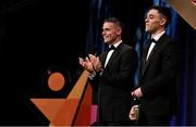 17 November 2023; Stephen Cluxton of Dublin, left, in the company of Conor McCluskey of Derry, applsuds as teammate Michael Fitzsimons, not pictured, is announced as a winner during the 2023 PwC GAA/GPA All-Star Awards at the RDS in Dublin. Photo by Brendan Moran/Sportsfile