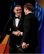 17 November 2023; Brian Fenton of Dublin, left, congratulates Brendan Rogers of Derry on his award during the 2023 PwC GAA/GPA All-Star Awards at the RDS in Dublin. Photo by Brendan Moran/Sportsfile