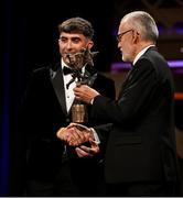 17 November 2023; Aaron Gillane of Limerick is presented with the PwC GAA/GPA Hurler of the Year award by Uachtarán Chumann Lúthchleas Gael Larry McCarthy during the 2023 PwC GAA/GPA All-Star Awards at the RDS in Dublin. Photo by Brendan Moran/Sportsfile