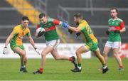 18 November 2023; Jack Irwin of Ballina Stephenites in action against Michael Lundy and Jack McCabe of Corofin during the AIB Connacht GAA Football Senior Club Championship Semi-Final match between Corofin, Galway, and Ballina Stephenites, Mayo, at Pearse Stadium, Galway. Photo by Ray Ryan/Sportsfile