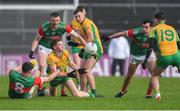 18 November 2023; Patrick Egan of Corofin in action against Jack Irwin and Frank Irwin of Ballina Stephenites during the AIB Connacht GAA Football Senior Club Championship Semi-Final match between Corofin, Galway, and Ballina Stephenites, Mayo, at Pearse Stadium, Galway. Photo by Ray Ryan/Sportsfile