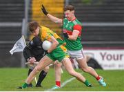 18 November 2023; Patrick Egan of Corofin in action against Sean Regan of Ballina Stephenites during the AIB Connacht GAA Football Senior Club Championship Semi-Final match between Corofin, Galway, and Ballina Stephenites, Mayo, at Pearse Stadium, Galway. Photo by Ray Ryan/Sportsfile