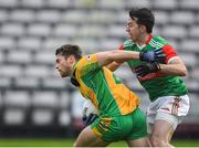 18 November 2023; Liam Silke of Corofin in action against Evan Regan of Ballina Stephenites during the AIB Connacht GAA Football Senior Club Championship Semi-Final match between Corofin, Galway, and Ballina Stephenites, Mayo, at Pearse Stadium, Galway. Photo by Ray Ryan/Sportsfile